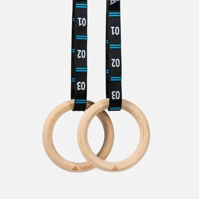 Caliathletics wooden rings with black and teal branded straps